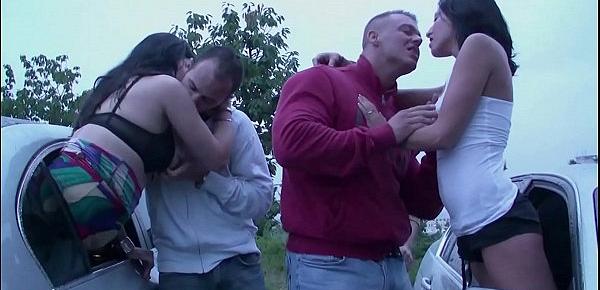  A girl is undressing on the way to a public sex gang bang dogging orgy